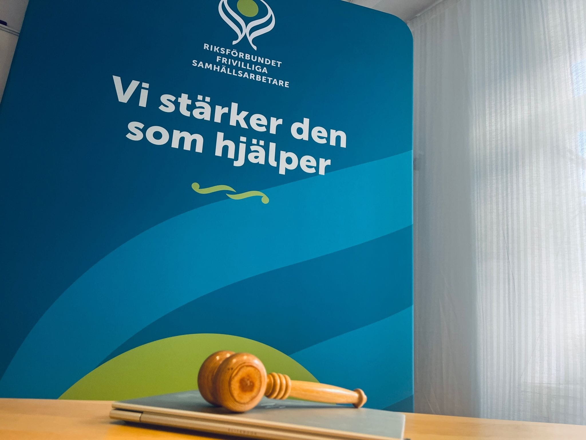 Foto fr&aring;n &aring;rsm&ouml;te, ordf&ouml;randeklubba och RFS backdrop